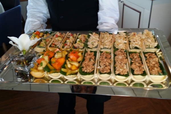 Delicious hors d'oeuvres served in bamboo boat